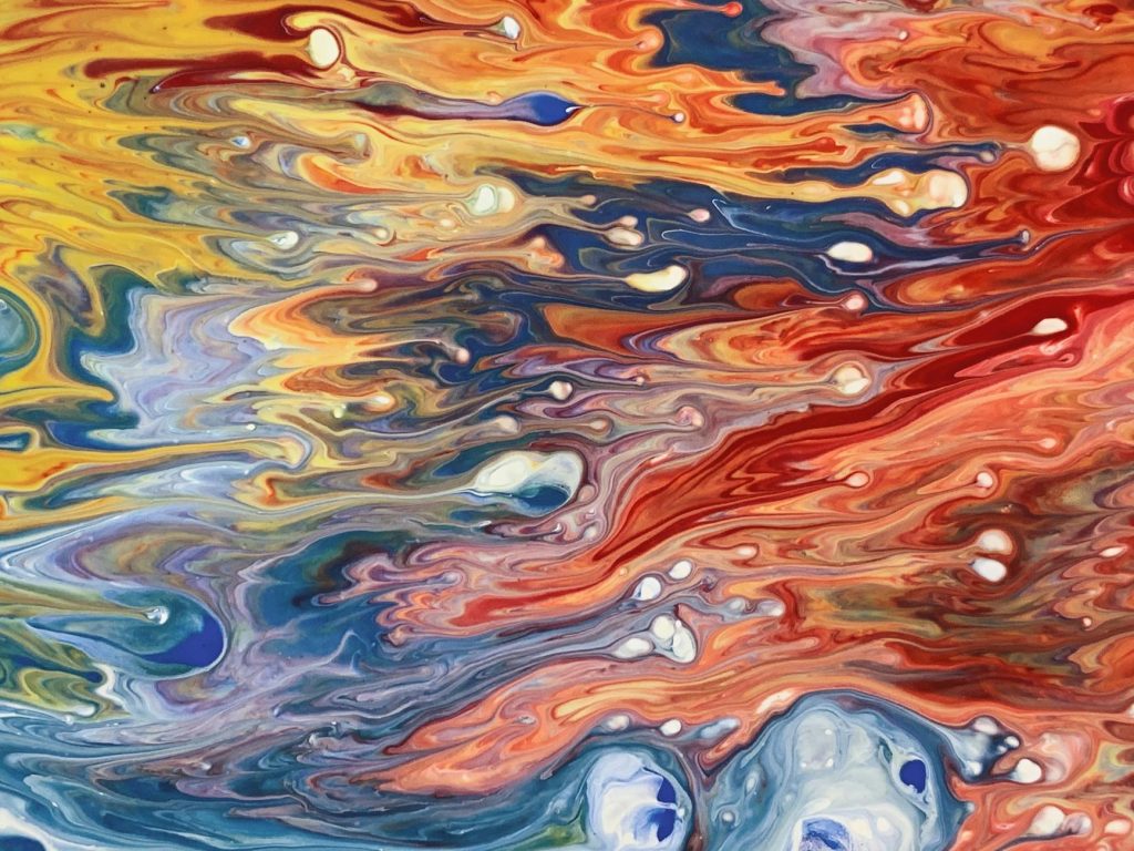 A vivid and dynamic abstract painting showcasing swirling colors in an artistic style.