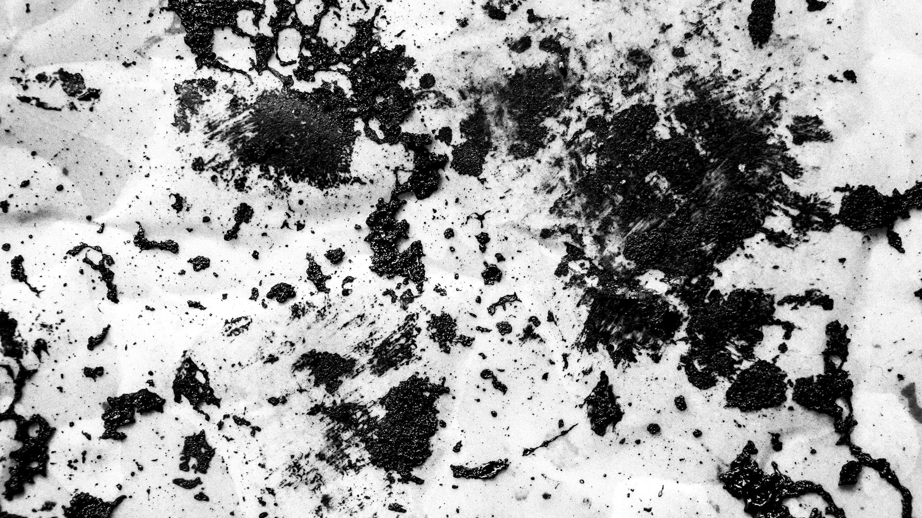 Black and white abstract splatter design perfect for backgrounds or artistic projects.